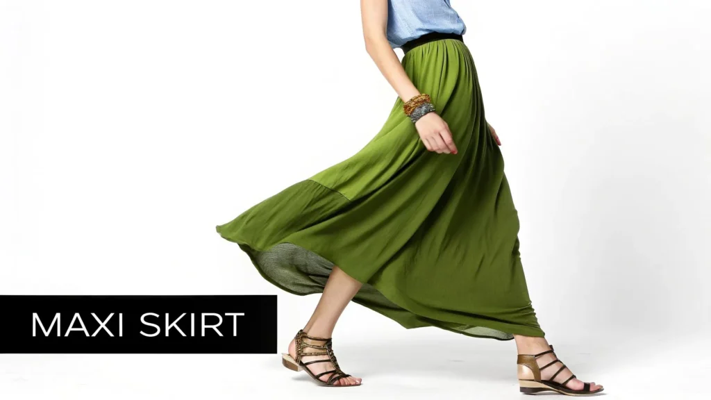 Woman walking in a flowing green maxi skirt paired with sandals, shown against a white background, with the text ‘Maxi Skirt’ displayed.
