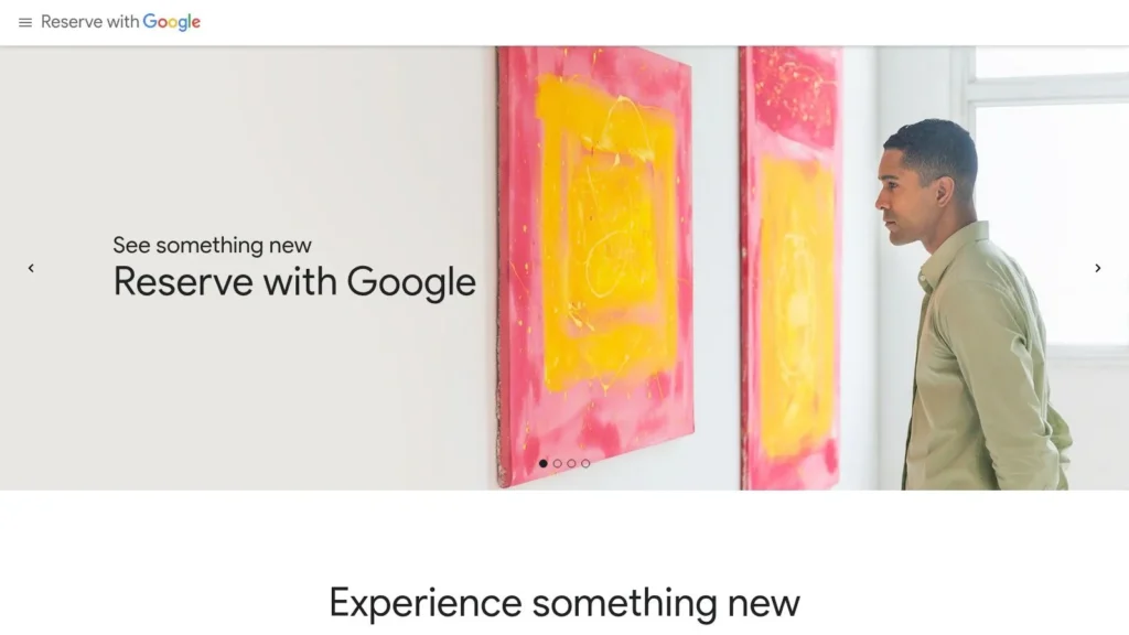 7 Essential Booking Tools for Restaurants in Florence Italy (2026 Guide) a man in green shirt in bright gallery is looking at red and yellow pictures on the wall