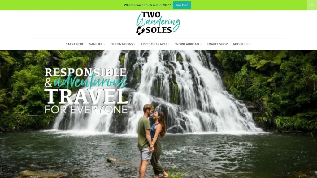 Two Wandering Soles travel blog homepage featuring a couple standing in front of a lush waterfall with the headline “Responsible & Adventurous Travel for Everyone.”
