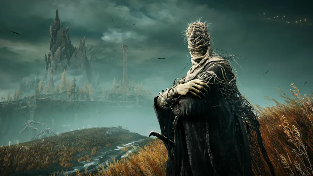 Elden Ring scene of a cloaked figure with a wrapped face standing in a misty field with a distant castle and tower