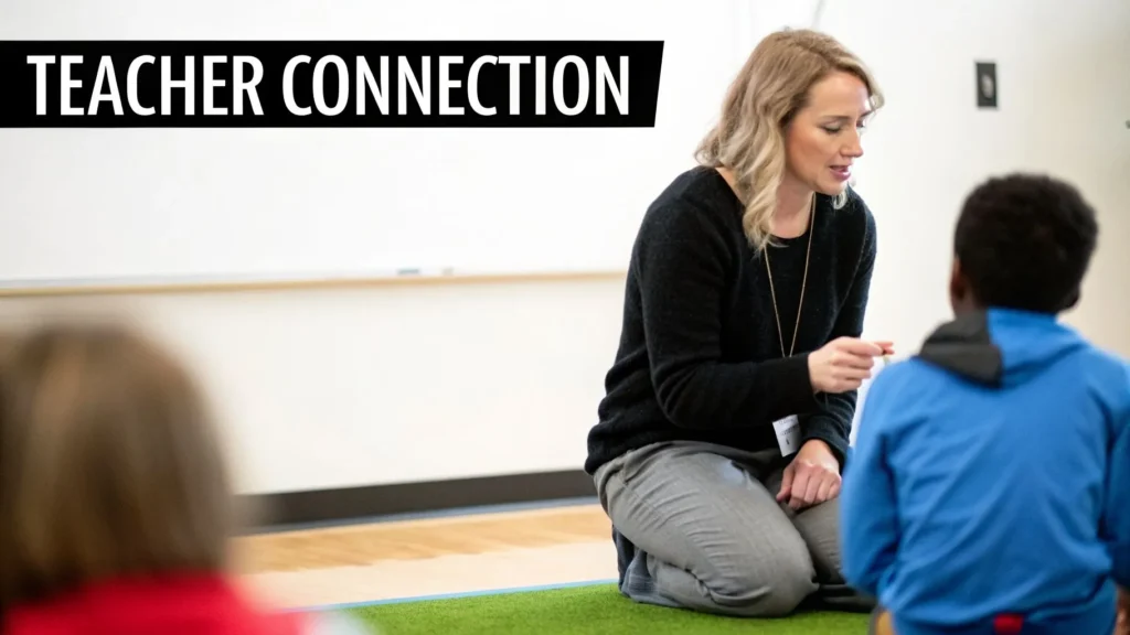 Teacher kneeling on classroom floor speaking with student, building connection, text overlay “Teacher Connection”