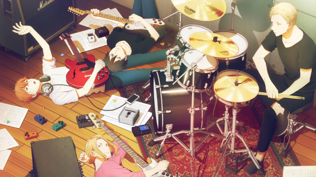 Anime band members relax on a studio floor surrounded by guitars, drums, and music sheets.