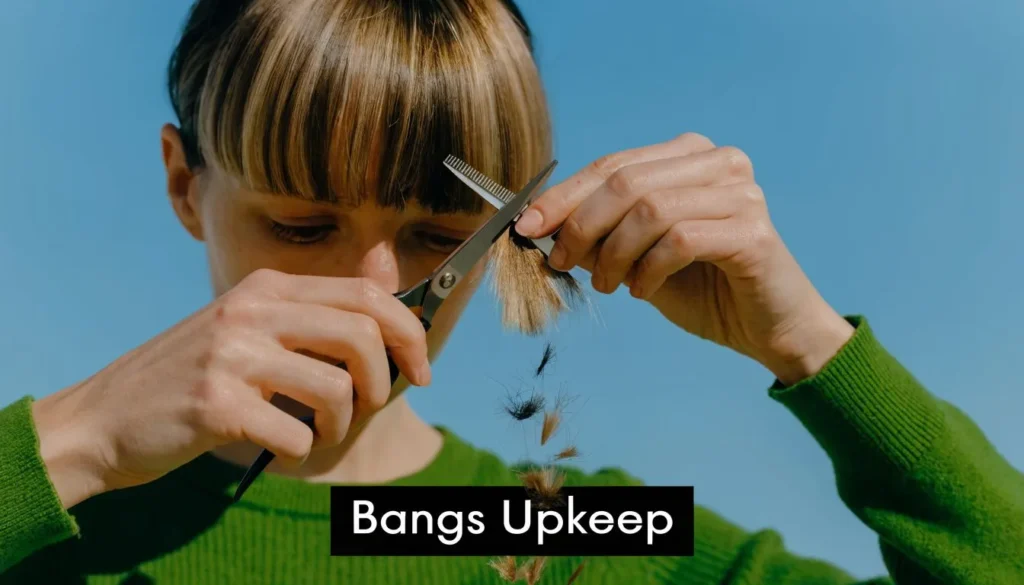 Person trimming bangs with scissors at home, demonstrating fine hair bang maintenance and upkeep.