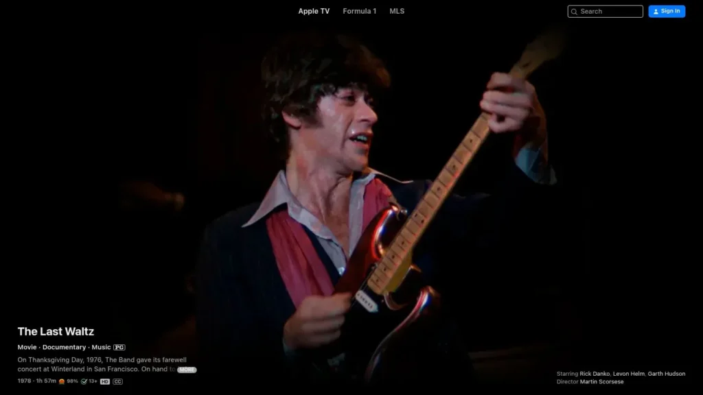 Apple TV page for The Last Waltz showing a guitarist performing live during the concert documentary.