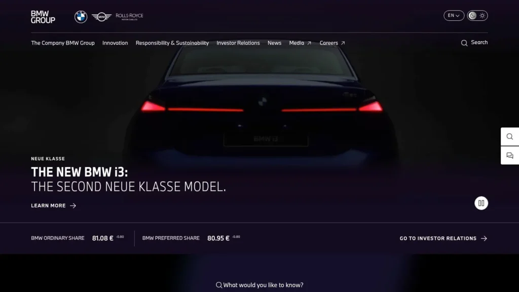 BMW Group homepage featuring the new BMW i3 with dark futuristic design and investor information.
