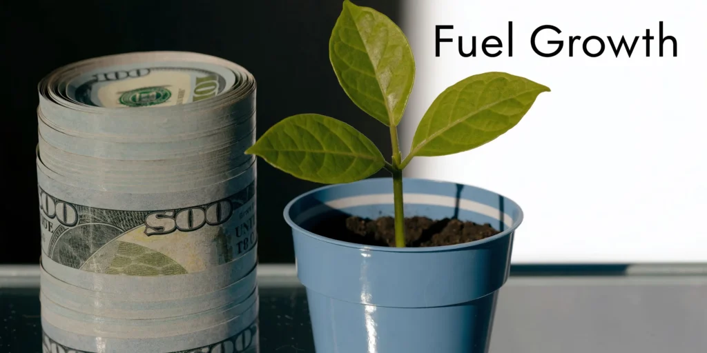 How to Grow Small Business: Your 2026 Playbook Stack of $100 bills beside a potted plant sprout, symbolizing financial growth, labeled “Fuel Growth”
