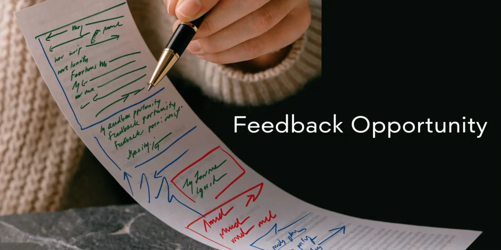 Person reviewing marked-up manuscript notes beside “Feedback Opportunity” text with editing comments.
