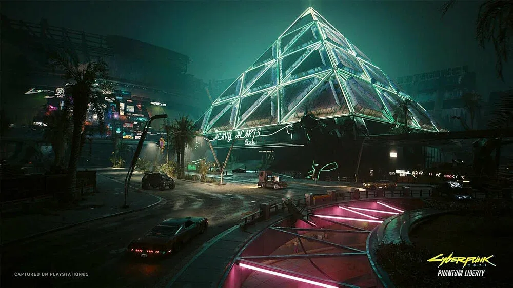 7 Best Games with Character Customization for 2026 Futuristic neon-lit city at night featuring a glowing glass pyramid, wet streets, vehicles, and cyberpunk architecture.